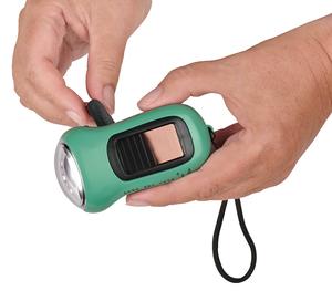 Solar LED flashlight with dynamo