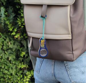 Pocket magnifying glass with cord