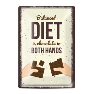 Balanced diet is chocolate in both hands